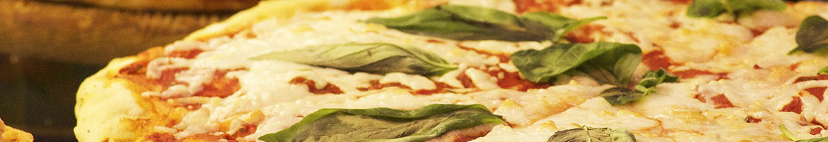 Eating Italian Pizza at Alfredo's Italian Kitchen restaurant in Somerville, MA.